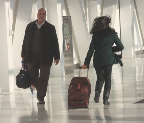 Airport passenger running